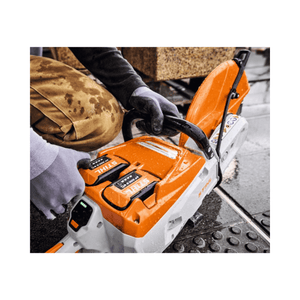TSA 500 Cordless Disc Cut-Off Machine 14" being used by a tree surgeon outdoors.