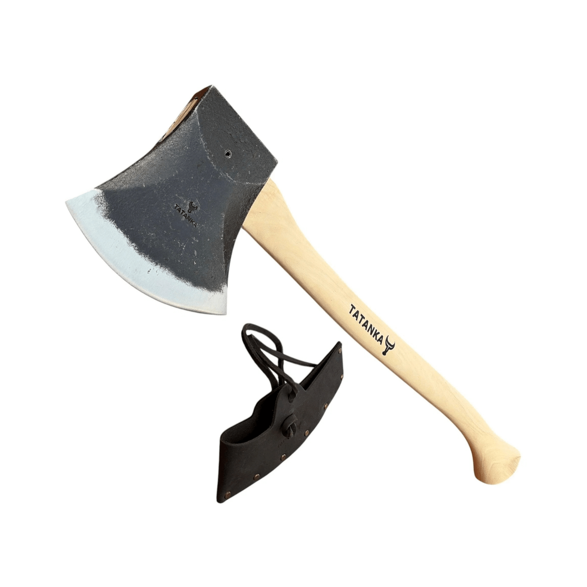 A hand axe with a black steel head, light wood handle, and black leather sheath on a plain white background. The handle is printed with the brand name 'TATANKA'.