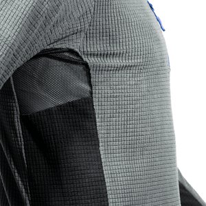 Close-up of Teufelberger Arctic Long Sleeve Fleece highlighting mesh underarm panel and textured fabric.