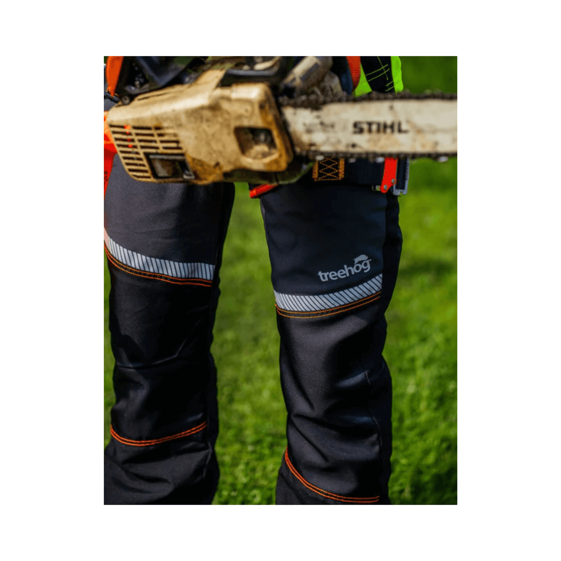 Treehog TH250 Essential Class 1 chainsaw trousers worn by a professional, showcasing safety and comfort during outdoor work.