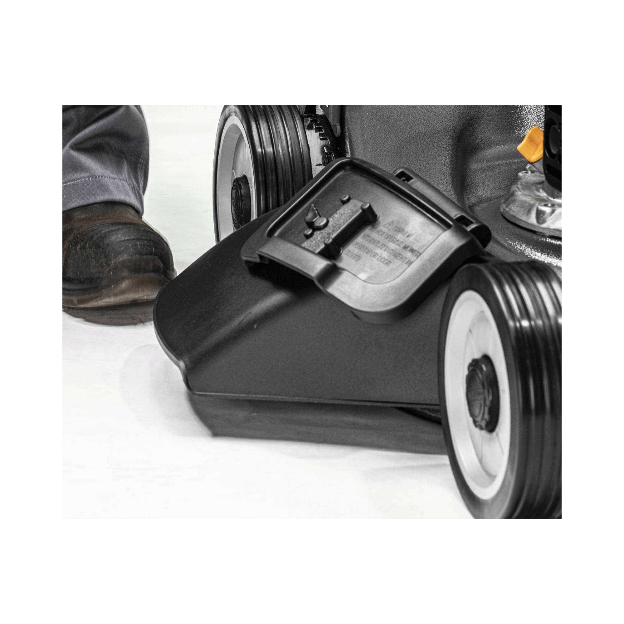 Close-up of the debris bag on the Virtue 50 SSD self-propelled petrol lawn mower, showcasing its robust design.