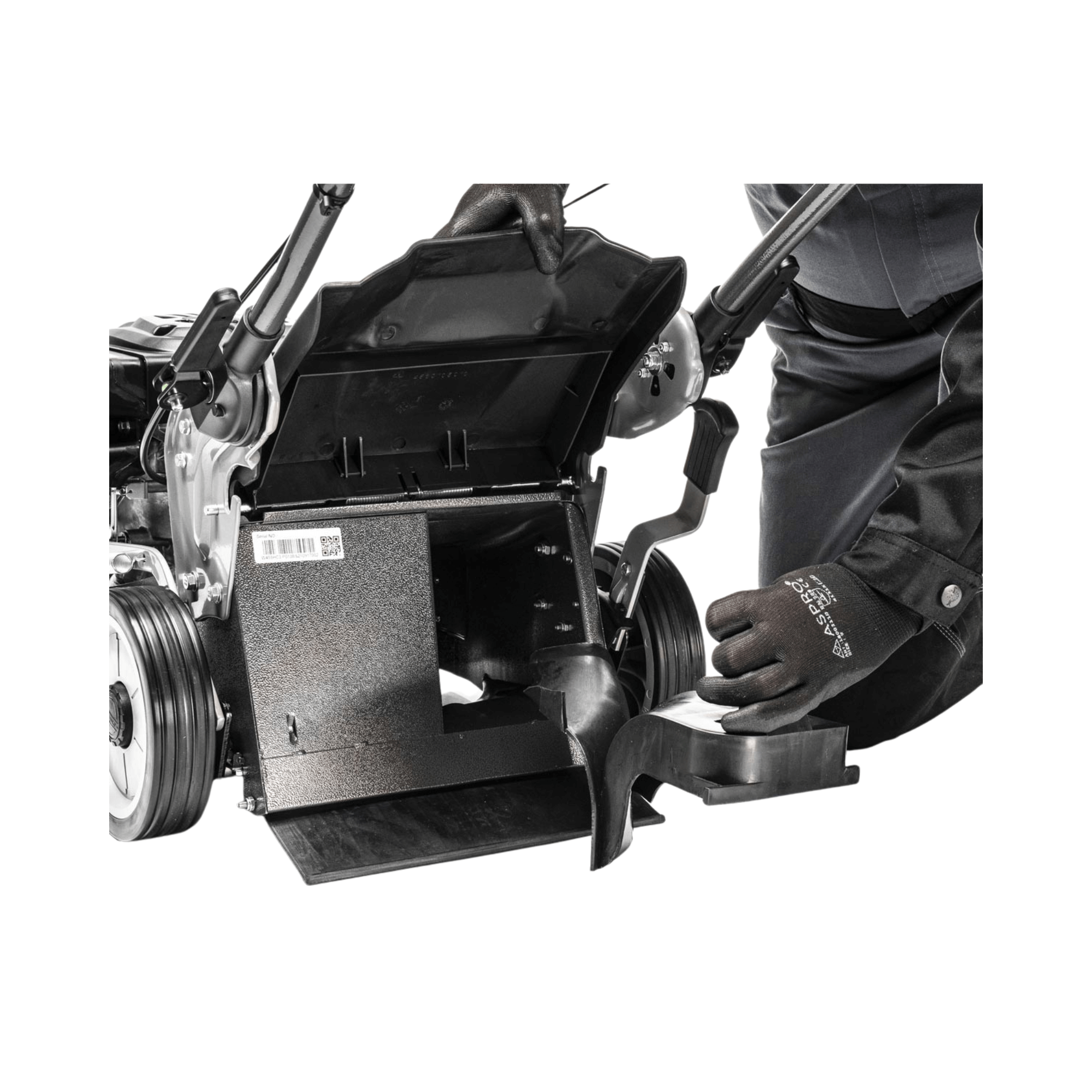 Close-up of a user inspecting the interior of the Weibang Virtue 50 SSD lawnmower's grass collector.