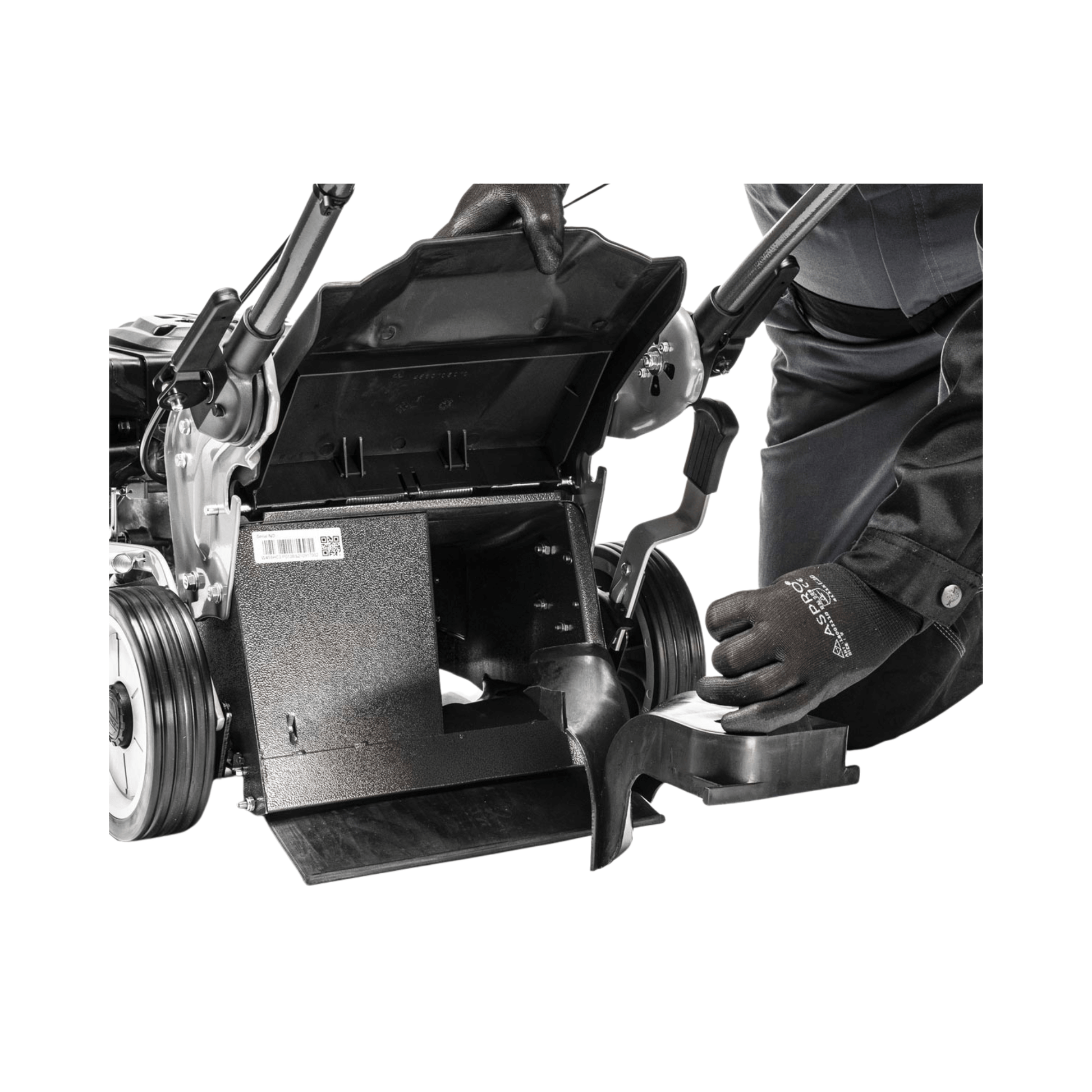 Close-up of a user inspecting the interior of the Weibang Virtue 50 SSD lawnmower's grass collector.