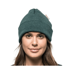 Beanie Classic wool beanie in Forest Green color worn by a woman, ideal for outdoor professionals and long-shift workers.