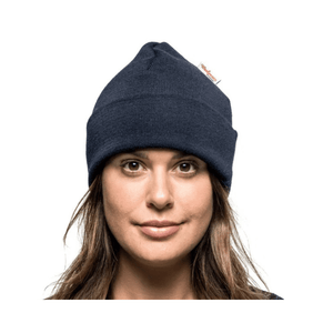 Beanie Classic in Dark Navy worn by a woman, showcasing premium merino wool for warmth and comfort.