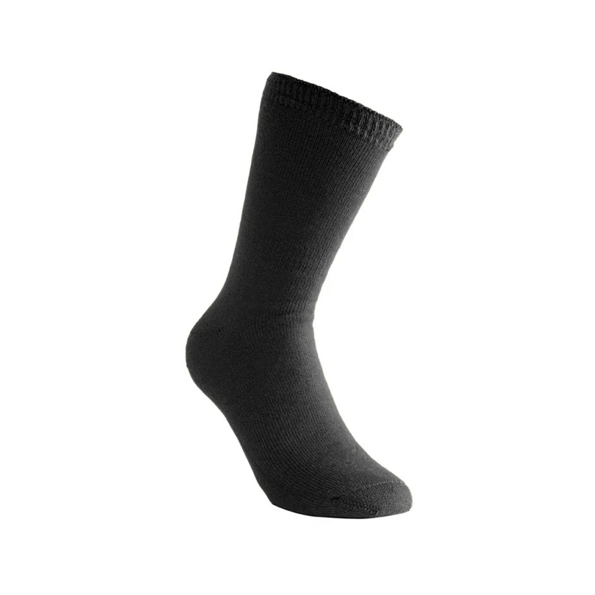 Woolpower Socks Classic 400 in dark color, designed for outdoor professionals and work wear, offering premium comfort.