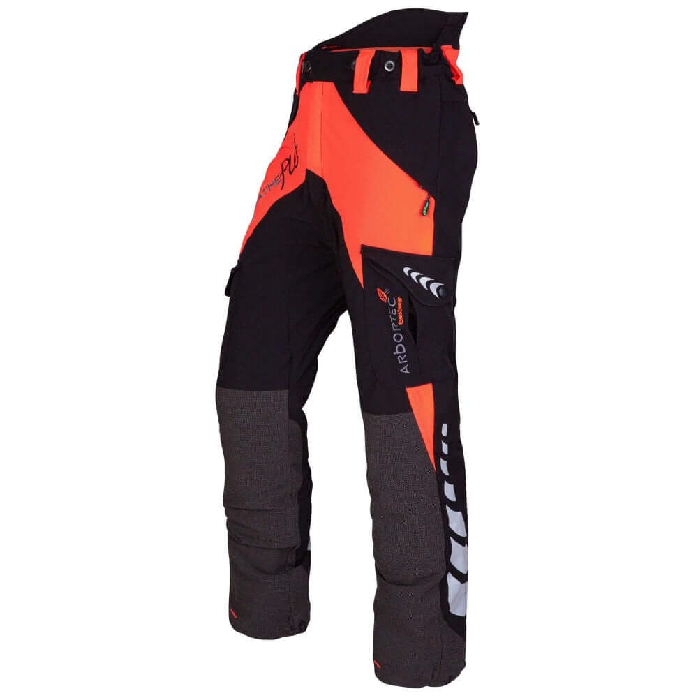 A pair of Breatheflex chainsaw trousers in orange and black, designed for arborists and foresters, with reinforced seams and multiple pockets.