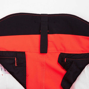 Inside view of Breatheflex Chainsaw Trousers in Hi-Vis Orange, designed for tree surgeons for safety and comfort.