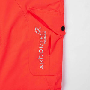 Arbortec Breatheflex chainsaw trousers pocket detail in hi-vis orange, designed for tree surgeons and arborists.