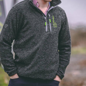 Man wearing Arbortec Wolf Half-Zip Knitted Fleece in grey, ideal for tree surgeons and outdoor activities.