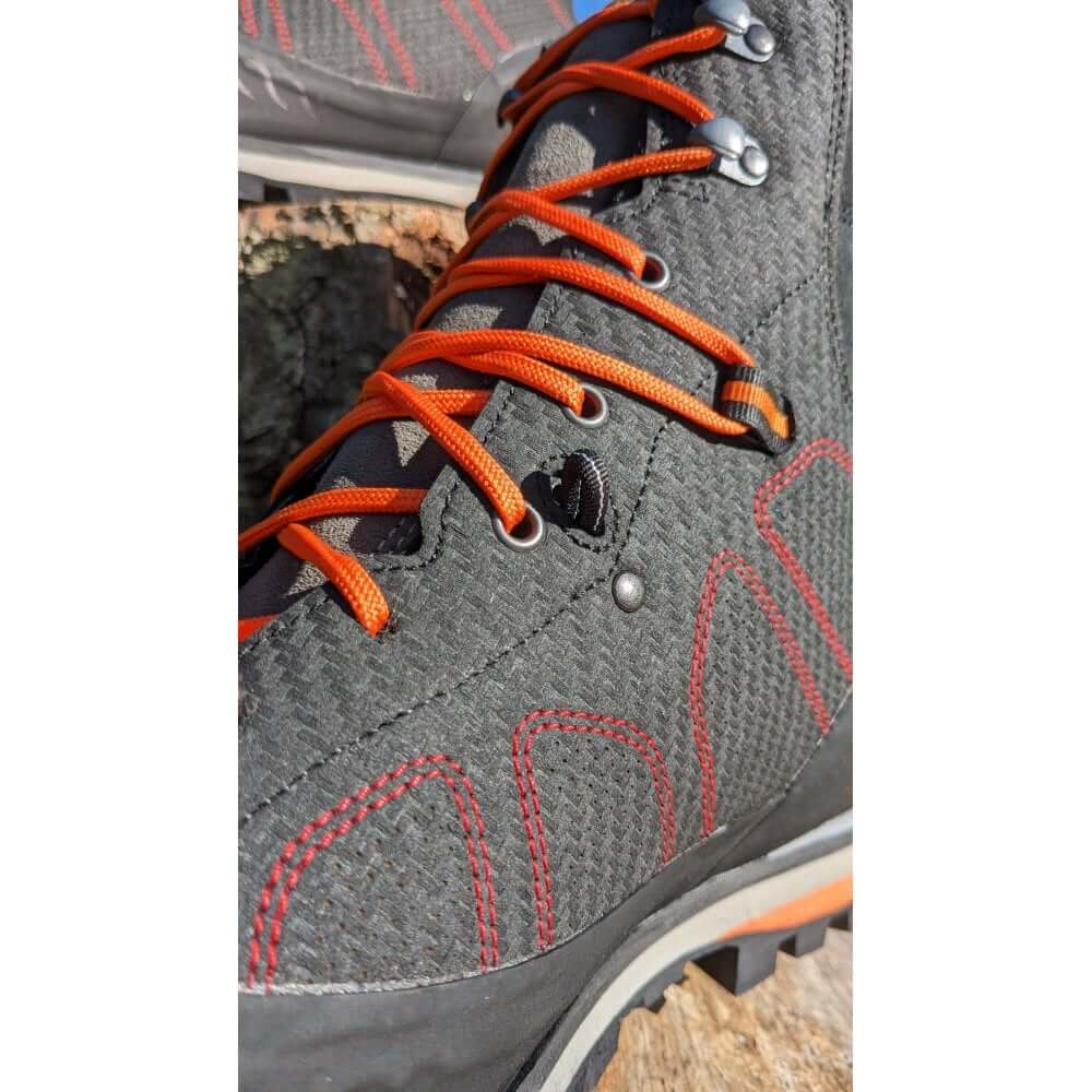 Close-up of Arbpro EVO Chainsaw Boots featuring durable material and orange laces, ideal for tree surgeons.