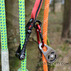 Close-up of ART Trapeze 4 pulley system and colorful ropes for tree surgeons, enhancing canopy navigation.