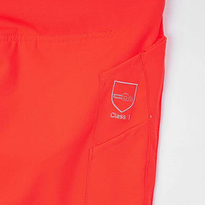 Detail of Breatheflex Chainsaw Trousers showing Class 1 certification badge in Hi Viz Orange, ideal for tree surgeons.