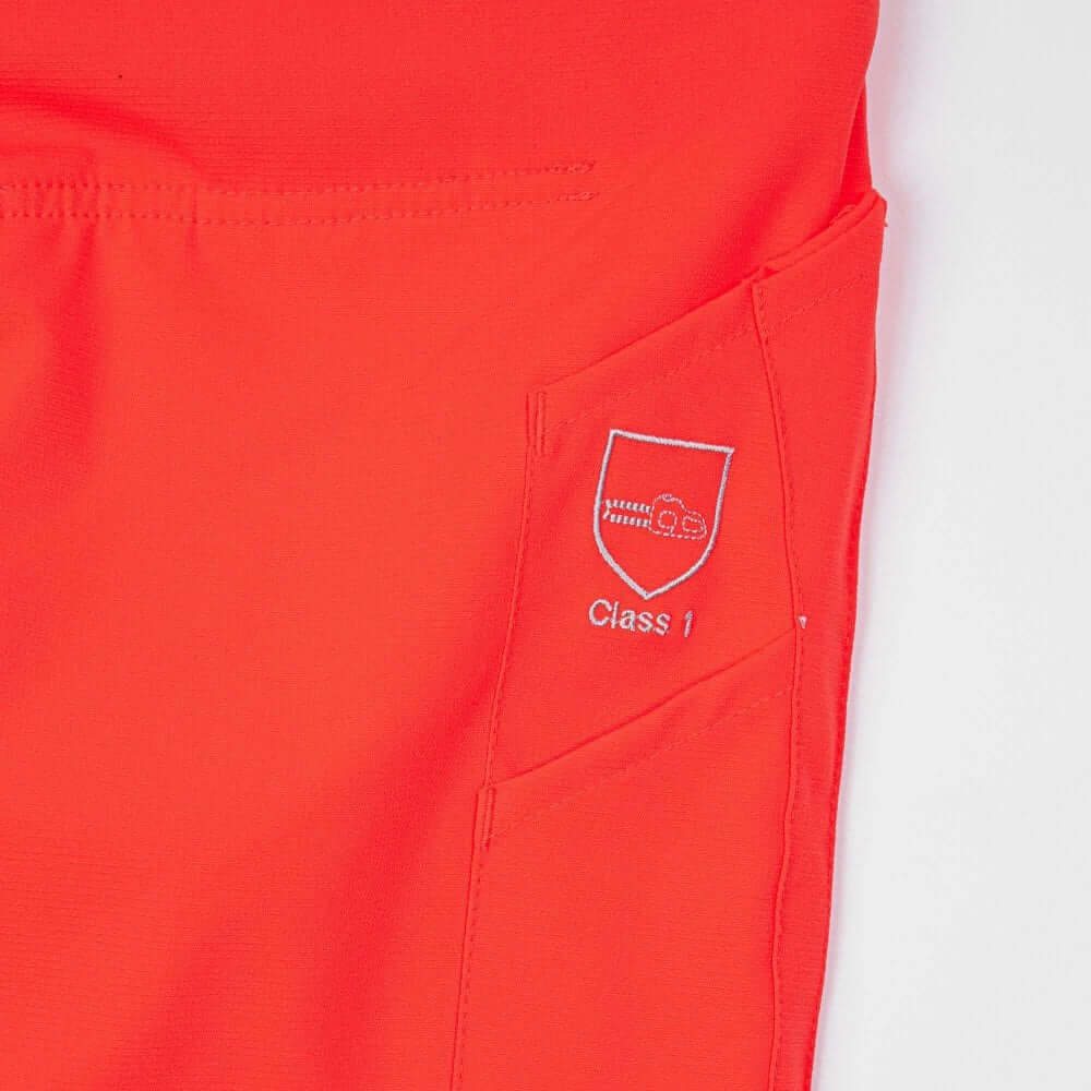 Close-up of Class 1 label on Breatheflex Chainsaw Trousers in Hi Viz Orange for tree surgeons.