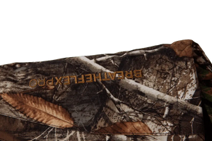 Close-up of Breatheflex Pro Realtree Brown Work Jacket showcasing camouflage design and branding details.