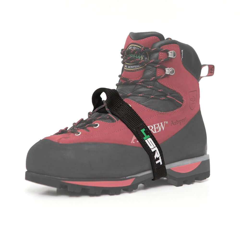 A black foot ascender device attached to a red and black climbing boot.
