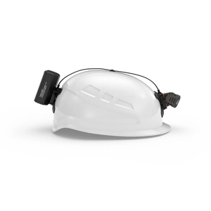FreeLight 1200 headlamp attached to a white hard hat, ideal for tree surgeons and outdoor professionals.