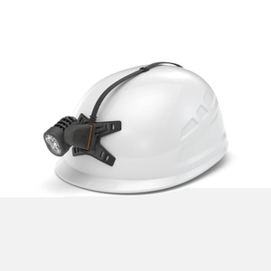 FreeLight 3000 head torch mounted on a white hard hat, ideal for tree surgeons and professionals requiring bright lighting.