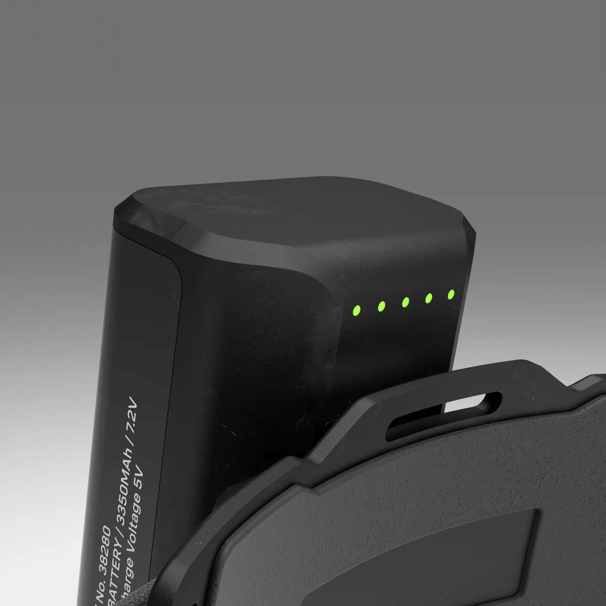 FreeLight 3000 headlamp battery showing charge indicator lights, ideal for tree surgeons needing powerful illumination.