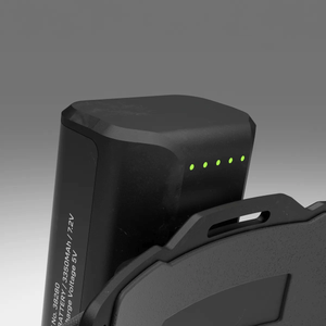 FreeLight 3000 headlamp battery showing charge indicator lights, ideal for tree surgeons needing powerful illumination.