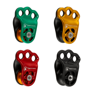 DMM Hitch Climber Eccentric pulleys in green, yellow, red, and black; essential gear for tree surgeons and climbing safety.