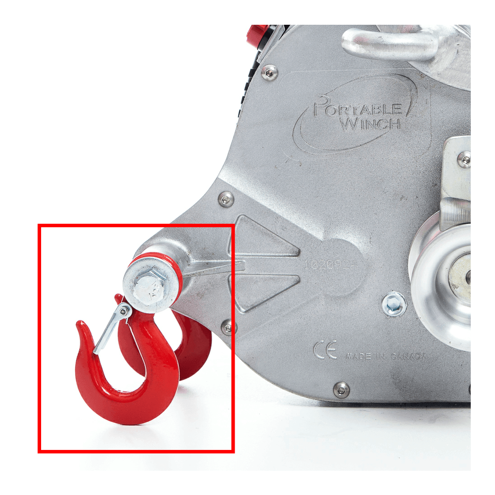 Close-up of a portable winch with a red hook on a white background