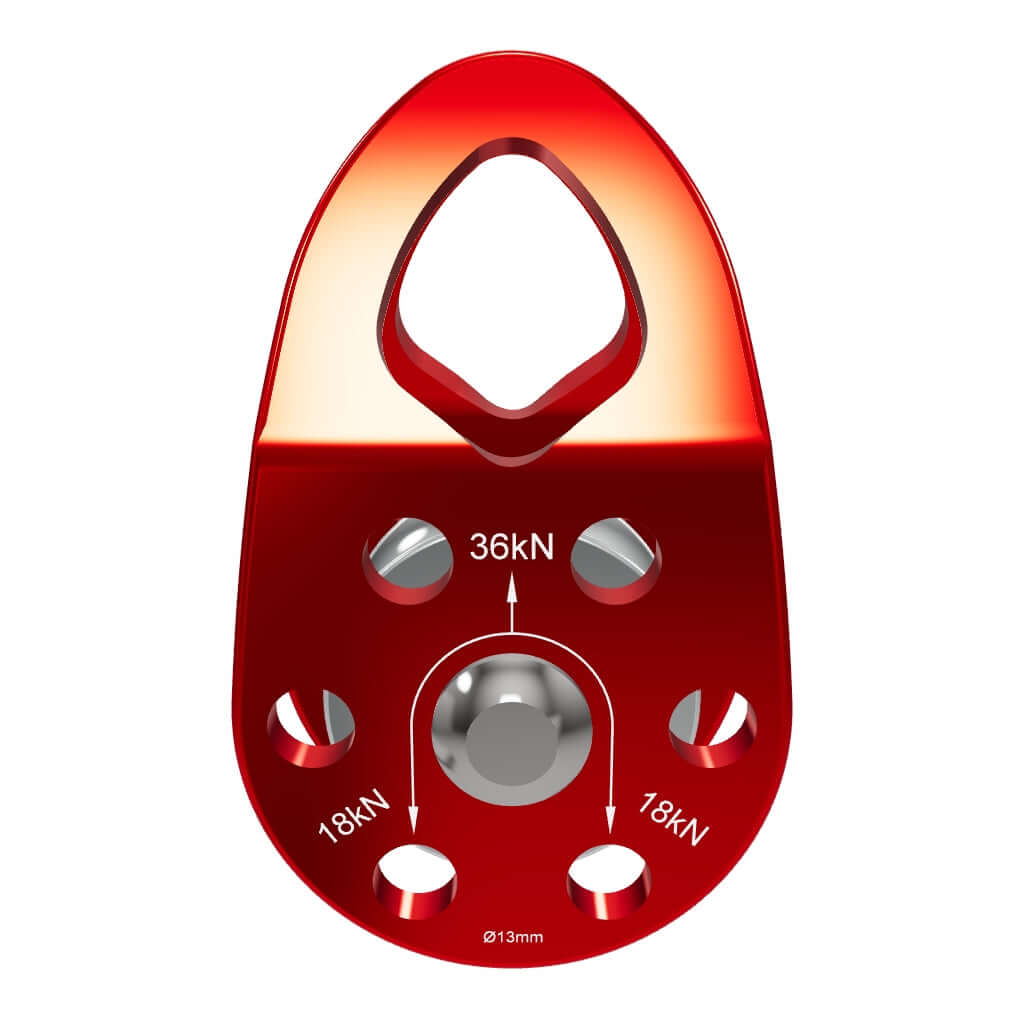 Red ISC small single pulley with swing cheek design, showing load ratings for climbing and rappelling applications.