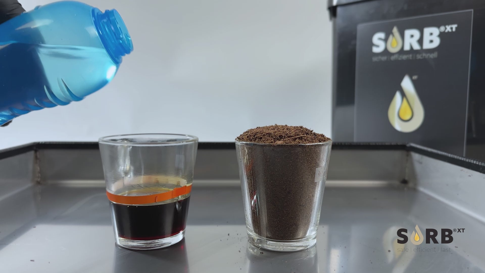 XT 5L Sachet Organic Binder demonstration with liquid absorption in glasses.