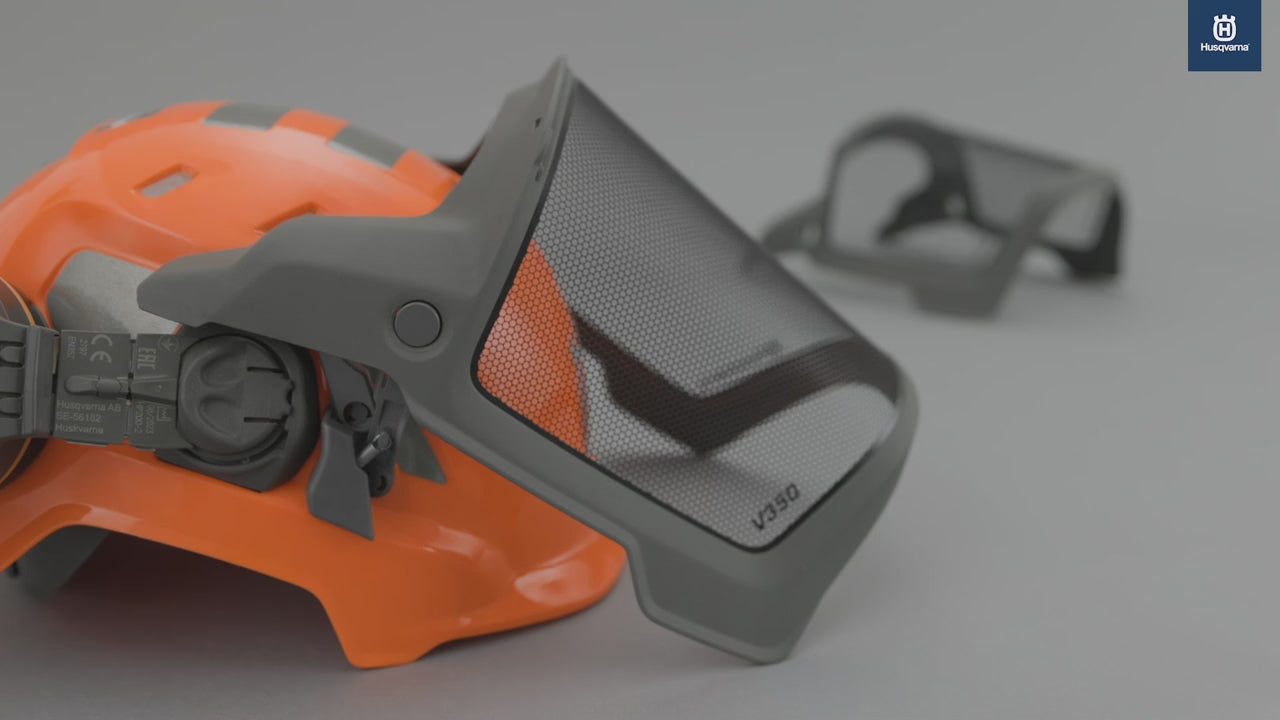 Technical Forest Chainsaw Helmet with protective visor and integrated ear defenders for arborists.