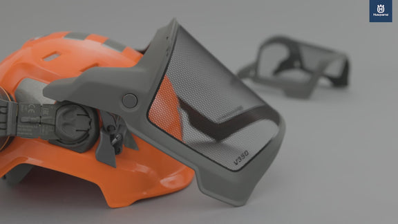 Technical Forest Chainsaw Helmet with protective visor and integrated ear defenders for arborists.