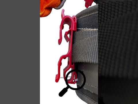 Close-up of the Buddy Lanyard Manager attached to a harness strap for effective rope management.