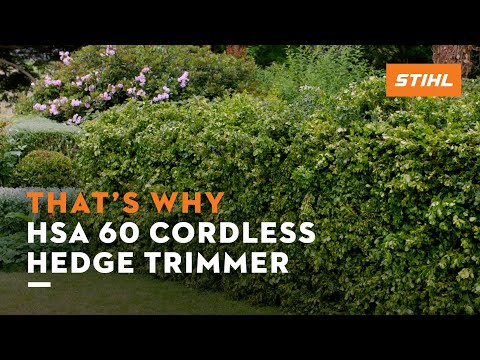 HSA 60 cordless hedge trimmer cutting through lush hedges, perfect for tree surgeons seeking precision and convenience.