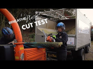 Breatheflex Pro Freestyle Chainsaw Trousers Type A Black worn by arborists during a cut test with a chainsaw.