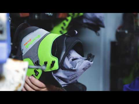 Scafell Lite Chainsaw Boots Class 2 showcased in a store, highlighting safety and comfort features for forestry work.