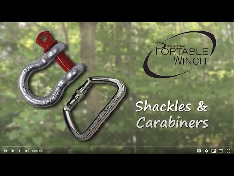 Steel and aluminum shackles and carabiners by Portable Winch, essential tools for tree surgeons and outdoor activities.