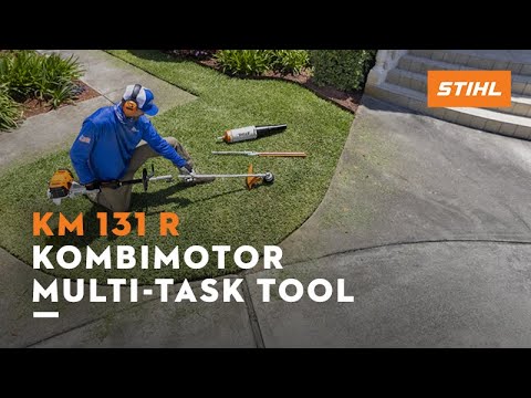 STIHL KM 131 R Kombi Engine being used as a multi-task tool for landscaping, ideal for tree surgeons.