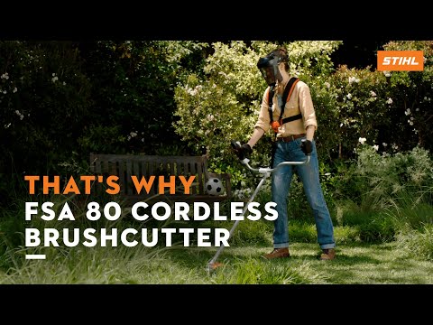 Person using the STIHL FSA 80 Cordless Brushcutter for garden maintenance with precision and quiet operation.