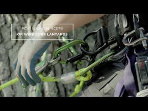 Close-up of using the Glide Rope Grab with rope and wire core lanyards for precise climbing adjustments.