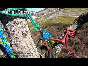 Rock Exotica DownRigger pulley in use for aerial friction by tree surgeons, showing high friction mode on a tree.