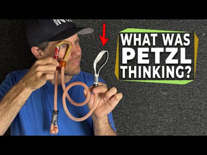 Person holding climbing gear discussing innovations in the industry, featuring the phrase 'WHAT WAS PETZL THINKING?'