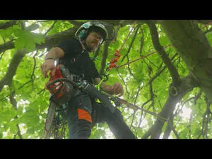 Arborist using the Catalyst Tree Climbing Harness while working in the canopy of a tree.