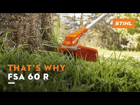 FSA 60 R cordless strimmer cutting grass around a tree, perfect for homeowners and tree surgeons.