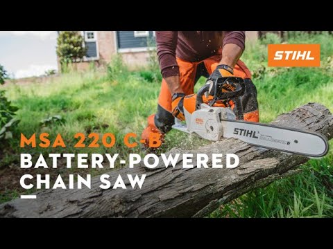 User operating STIHL MSA 220 C-B cordless chainsaw on a log, ideal for tree surgeons and professional cutting tasks.