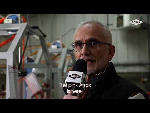 Man presenting the new pink Atrax climbing rope at a product launch event.