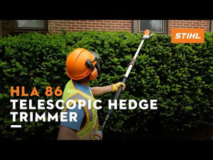 Professional using STIHL HLA 86 Telescopic Hedge Trimmer for tall hedges, ideal for Tree Surgeons.