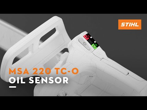 Close-up of MSA 220 TC-O chainsaw oil sensor with indicator lights, designed for tree surgeons and arborists.