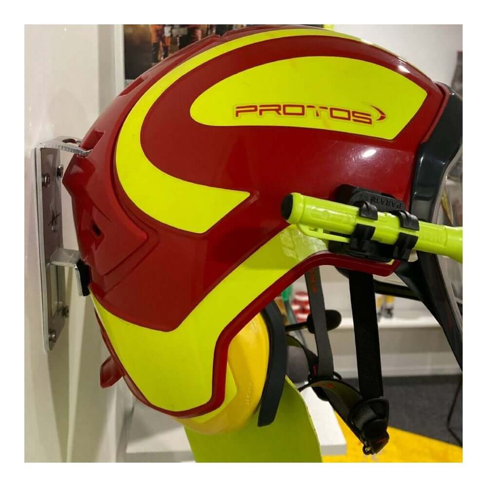 Protos Integral Forestry wall mount with bright red and yellow helmet designed for tree surgeons.