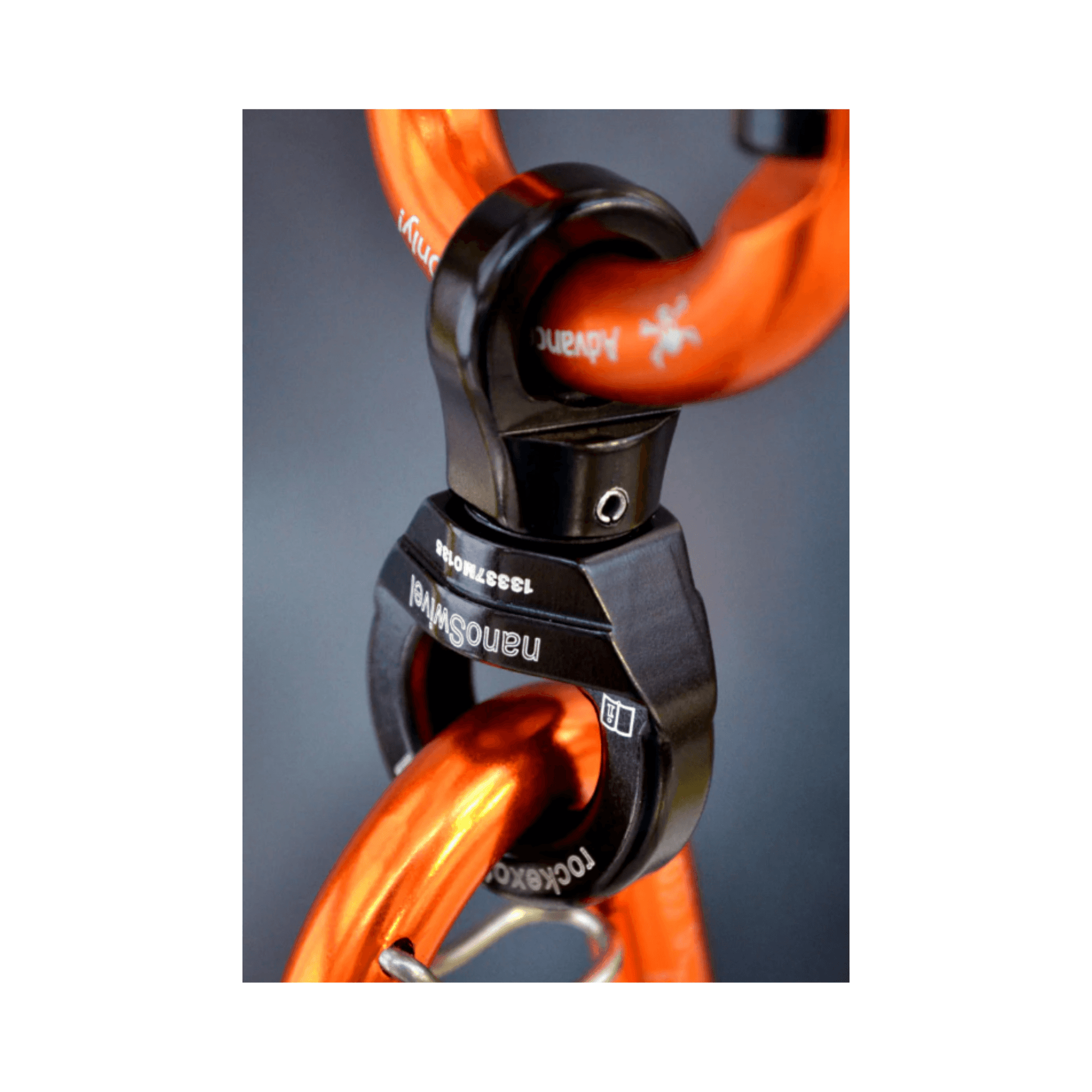 Close-up of Rock Exotica NanoSwivel, ultra-light load-rated swivel for arborists and climbers.