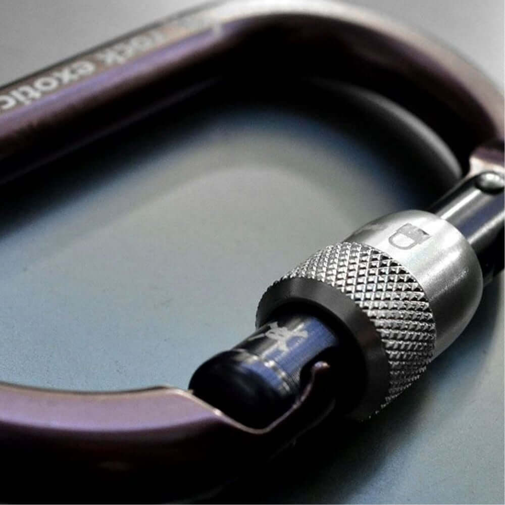 Close-up of RockO Screwgate Lock Carabiner with anodized aluminum parts, ideal for tree surgeons.