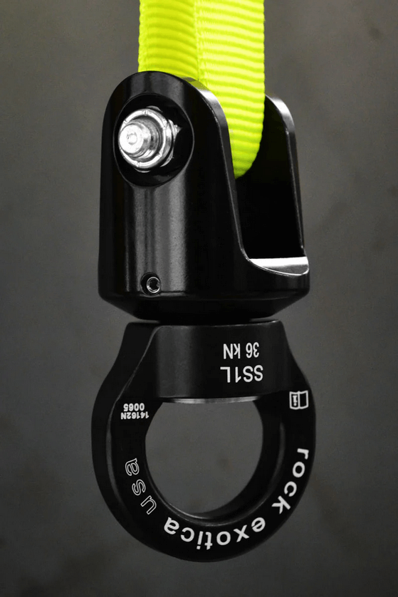 Rock Exotica SS1 shackle swivel in black with yellow webbing, designed for tree surgeons, showcasing enhanced durability.